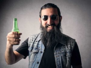 Man with alcohol bottle in hand